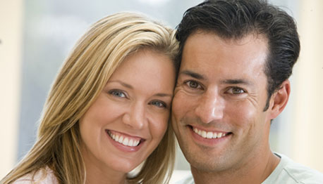 smiling husband and wife