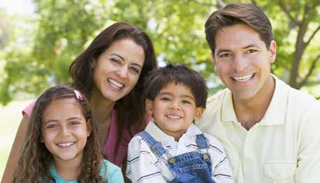 smiling family outside